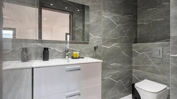 Apartment, Balcony, City View | Bathroom | Free toiletries, hair dryer, slippers, towels