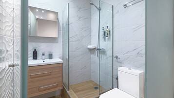 Deluxe Suite, City View | Bathroom | Shower, free toiletries, hair dryer, slippers