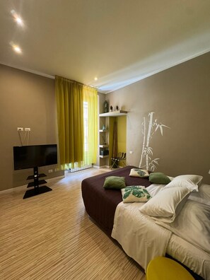 Habitación Deluxe con 1 cama matrimonial o 2 individuales | Caja de seguridad en la habitación, cortinas blackout y wifi gratis 