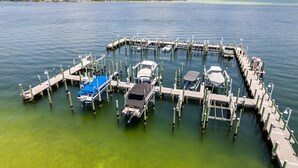 A marina with multiple docks and boats. - Destin West Gulfside V509 Condo (Fort Walton Beach)