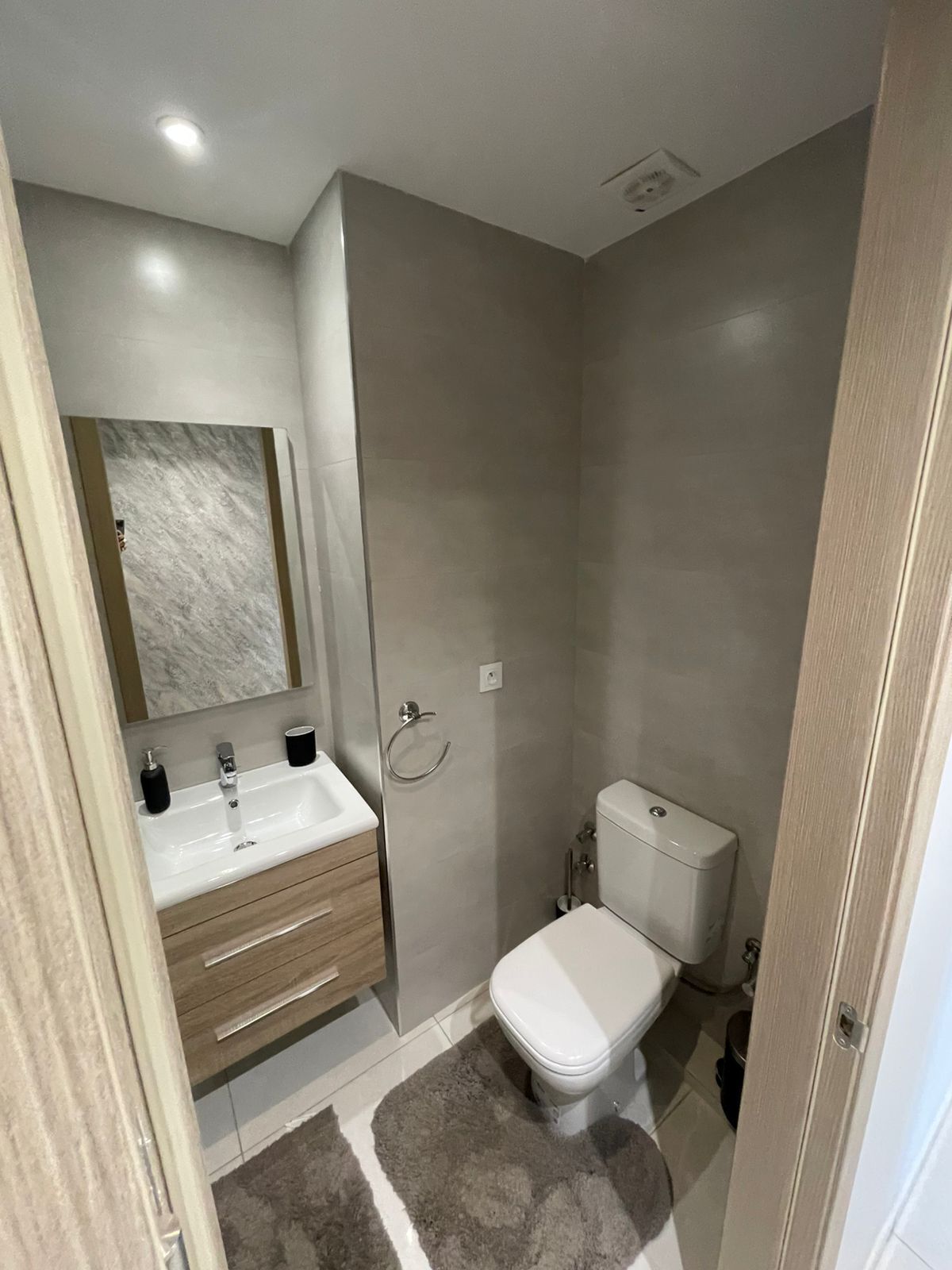 Shower, towels, soap, toilet paper