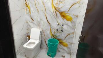 Deluxe Double Room, City View | Bathroom | Shower, free toiletries, slippers, towels