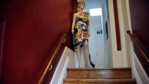 A wooden staircase with a mannequin at the top. - Oporto Private Room/TERRACE (Porto)