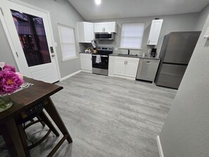 Private kitchen - Lovely 2-bedroom triplex unit with AC in charming Van Buren. (Van Buren)