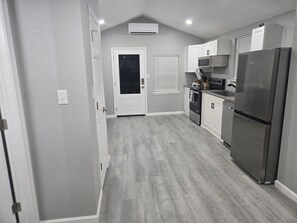 Private kitchen - Lovely 2-bedroom triplex unit with AC in charming Van Buren. (Van Buren)