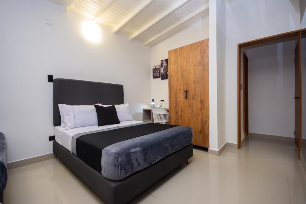 Desk, laptop workspace, free WiFi, bed sheets