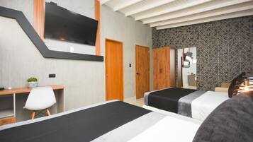 Een bureau, een laptopwerkplek, gratis wifi, beddengoed