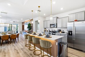 Fridge, microwave, oven, stovetop - Luxury Game Room Home with Pvt Pool and Summer Kitchen. Just Steps to Clubhouse (Clermont)