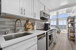 Fridge, microwave, oven, stovetop - Top-Floor Beachfront Loft – Sleeps 6 – Pet Friendly – Walk to Pier Park (Panama City Beach)