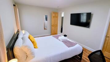 Iron/ironing board, travel crib, WiFi (free), bed sheets