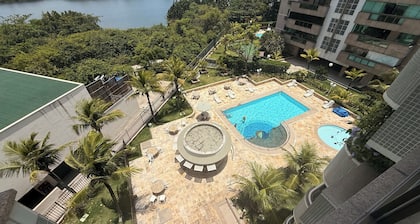 Beach and sun, foot in the sand, sea view lagoon
