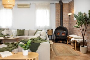 Fireplace, table tennis - Villa Selvatic with Sea Views, Pool, Sauna, and Cinema (Arenas)