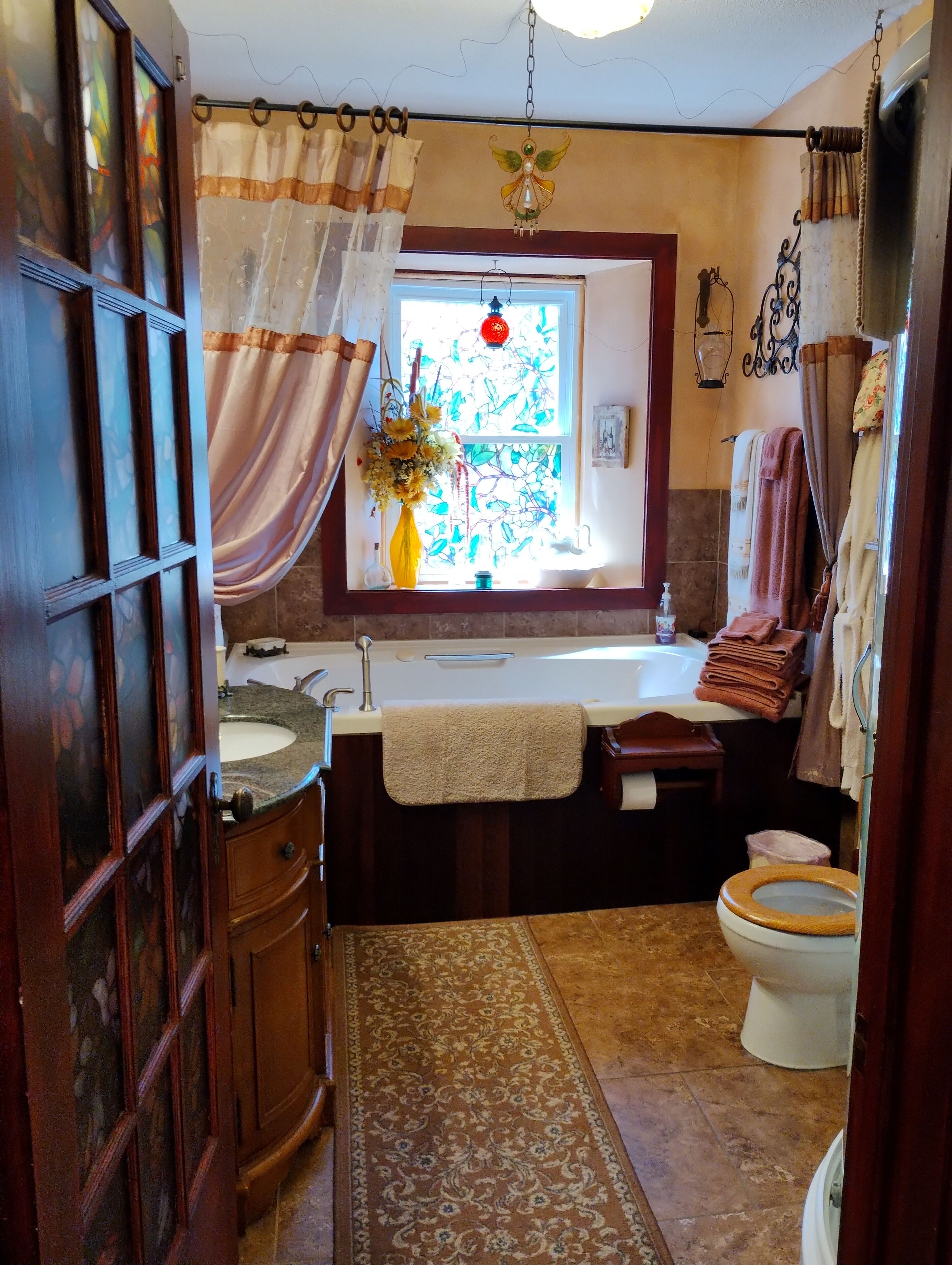 Shower, jetted tub, hair dryer, towels