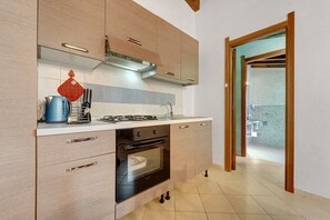 Private kitchen - Villa Nuragica - Classic Apartment (Nuraxi Figus)