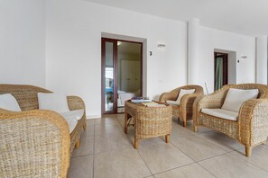 Interior - Villa Nuragica – Room with Private Bathroom and Pool View (Nuraxi Figus)