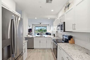 Fridge, microwave, oven, stovetop - #1524 - Lake and Golf View - Totally Updated! (Naples)