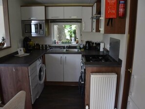 Cookware/dishes/utensils - Another Day In Paradise (Holt)