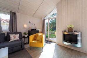 TV, fireplace, books, stereo - Vacation home Dünenpark 02a (Lübeck-Travemüde)