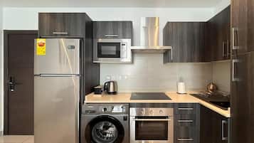 Appartement Deluxe, balcon, vue piscine | Cuisine privée