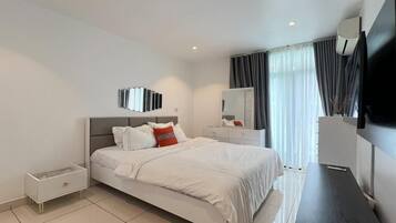 Deluxe Apartment, Balcony, Pool View | Egyptian cotton sheets, premium bedding, individually furnished