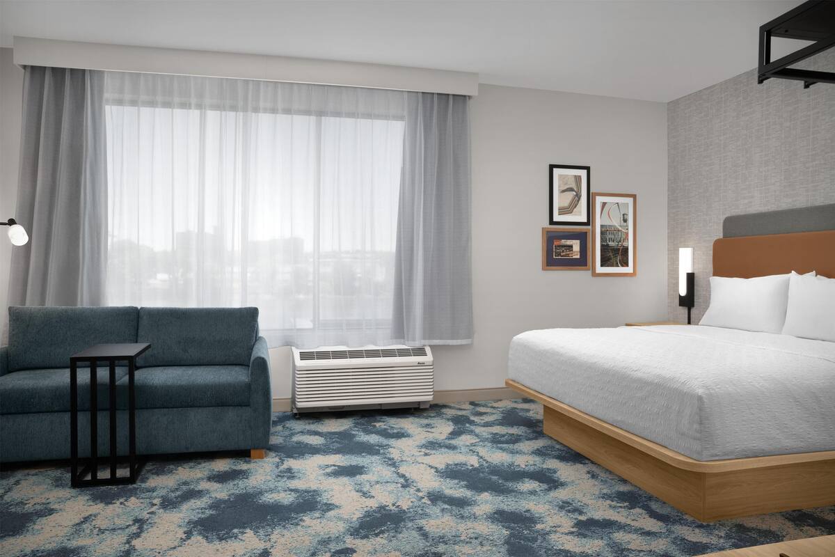 Suite, 1 kingsize bed, niet-roken (Water View, Microwave/Fridge) | Woonruimte