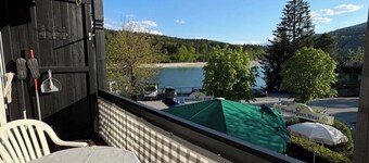 Walchensee vacation apartment with lake view, sauna & swimming pool.
