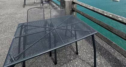 Ferienwohnung Walchensee mit Seeblick, Sauna & Schwimmbad.