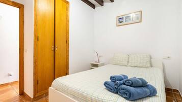 Blackout curtains, iron/ironing board, free WiFi, bed sheets