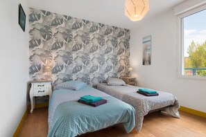 3 slaapkamers, een strijkplank/strijkijzer, beddengoed