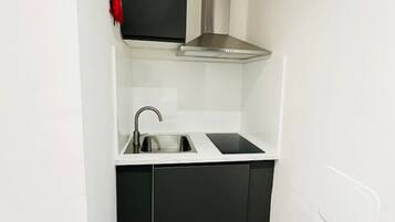 Fridge, microwave, stovetop, cookware/dishes/utensils