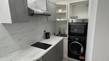 Fridge, microwave, cookware/dishes/utensils