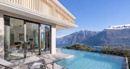 A newly built, high-end villa featuring an infinity pool and stunning views over Lake Garda. Located just a short drive from Limone sul Garda, it offers elegant, bright interiors designed with great attention to detail. A spacious panoramic terrace, mode