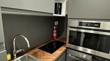Microwave, oven, cookware/dishes/utensils