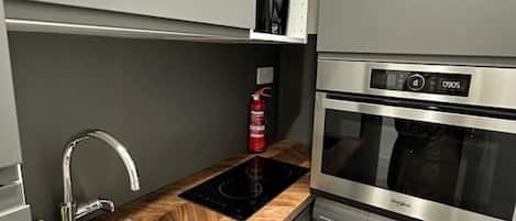 Microwave, oven, cookware/dishes/utensils
