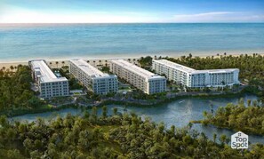 A modern hotel complex with multiple buildings, a beachfront, and a lake. - ¡Oceanfront TopSpot® @ Cartagena´s Best Beach! (Cartagena de Indias)