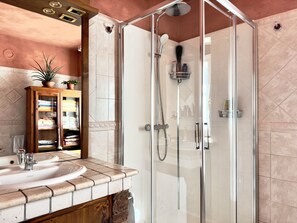 Bidet, towels, soap, toilet paper
