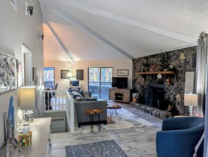 Smart TV, fireplace, books