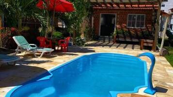 Deluxe Suite, Pool View | Terrace/patio