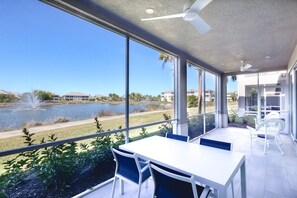 Outdoor dining - Chic Coastal Apt w/ Lake Views & Stunning Sunsets (Naples)