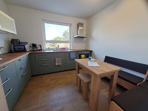 Comfort House, Garden View | Private kitchen - Ferienwohnungen im Grund 22 (Hoppegarten)