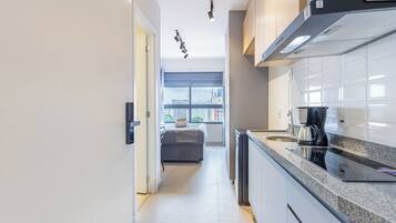 Apartamento conforto, banheiro privativo, vista para a cidade | Parte interna