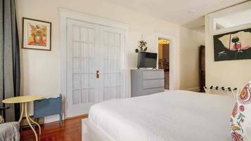 1 bedroom, desk, iron/ironing board, travel cot