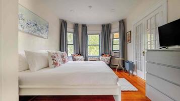 1 bedroom, desk, iron/ironing board, travel cot