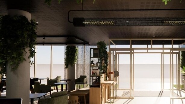 Un interior moderno con un amplio espacio abierto, una zona de bar y diferentes disposiciones de asientos.