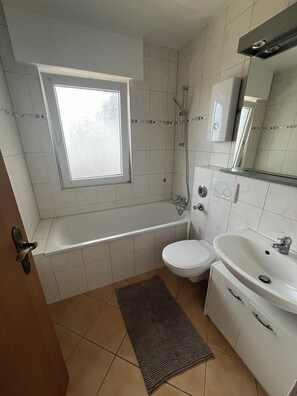 Hair dryer, towels, soap, shampoo