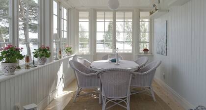 Semi-detached villa with lake plot, jetty & rowing boat