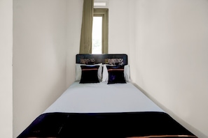 Deluxe Double Room | Bed sheets - OYO 95170 Purnama Baru Syariah (Selorejo)