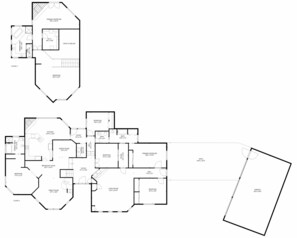 A floor plan of a house with two floors, including a primary bedroom, secondary bedroom, kitchen, dining room, living room, family room, foyer, and a garage. - Scottsdale Oasis with Pool & Mountain Views (Scottsdale)