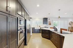 Fridge, microwave, oven, stovetop - Dog-friendly modern stay with a heated private pool, sun room, & grill (Tucson)