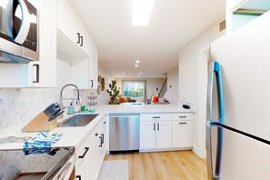 Fridge, microwave, oven, stovetop - 2-story dog-friendly condo with patio, outdoor pool, W/D, streaming, partial AC (Scottsdale)